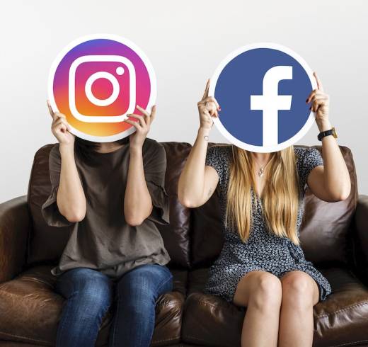 People holding social media icons